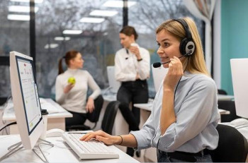 Woman working call center talking with clients using headphones microphone