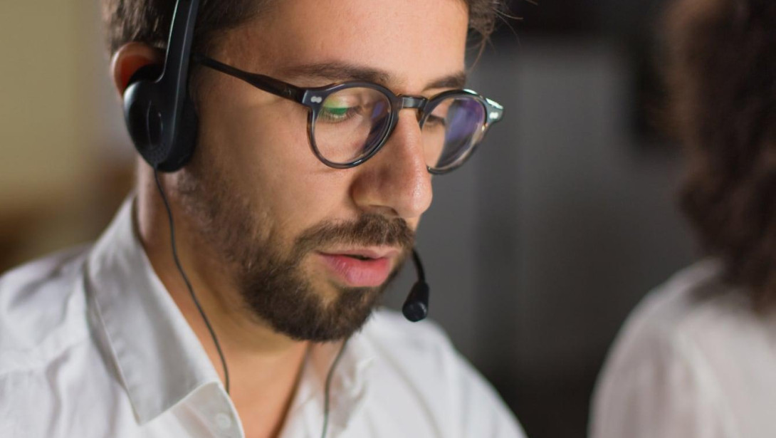 Closeup shot confident call center operator 1