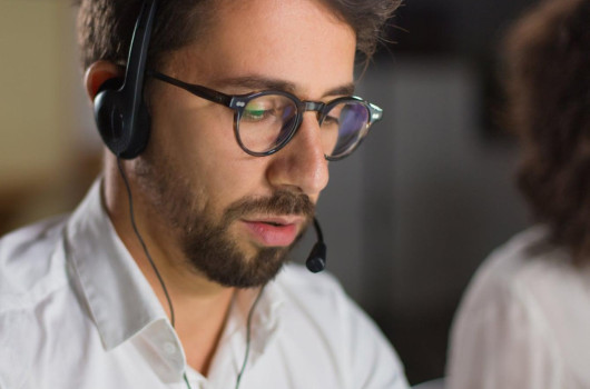 Closeup shot confident call center operator 1