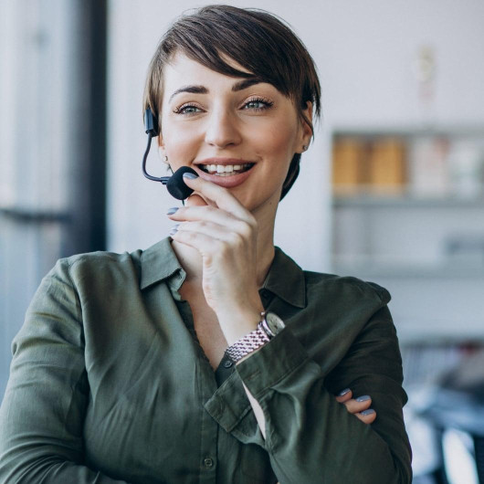 Young woman with microphone working record studio